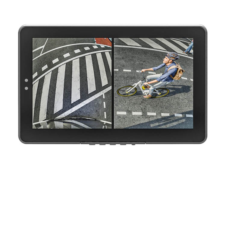 A smartphone screen displays a split view: the left side shows a zebra crossing on an urban road, and the right side shows a cyclist wearing a helmet and backpack riding a bike in a designated bike lane.